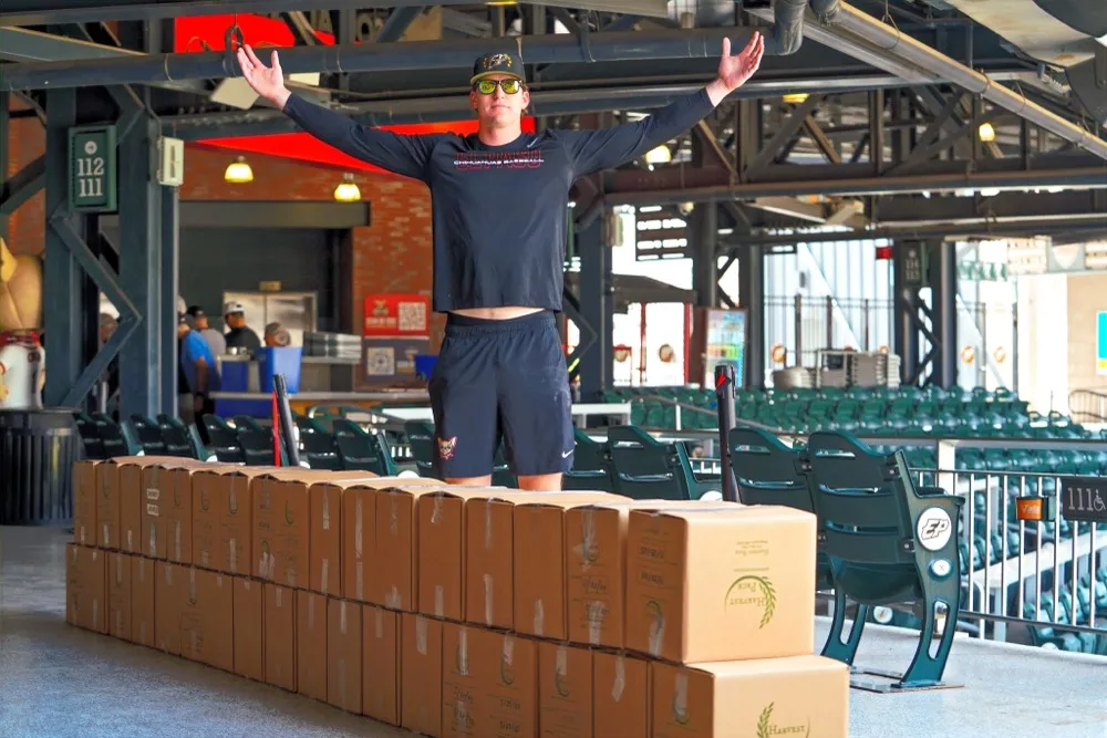 Stacks of packed Harvest Pack meal boxes ready for donation